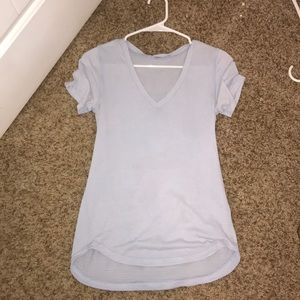 Short sleeve light blue Lululemon top V-neck.